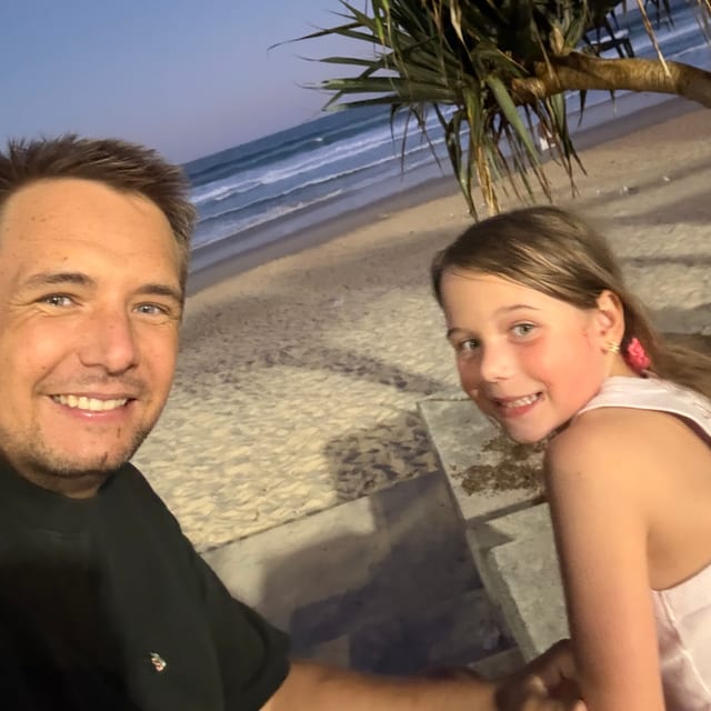 Daine and Thea at the beach at sunset